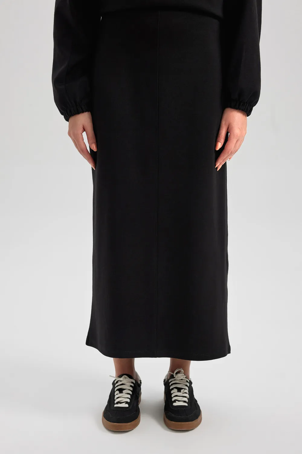 تنورة طويلة واسعة