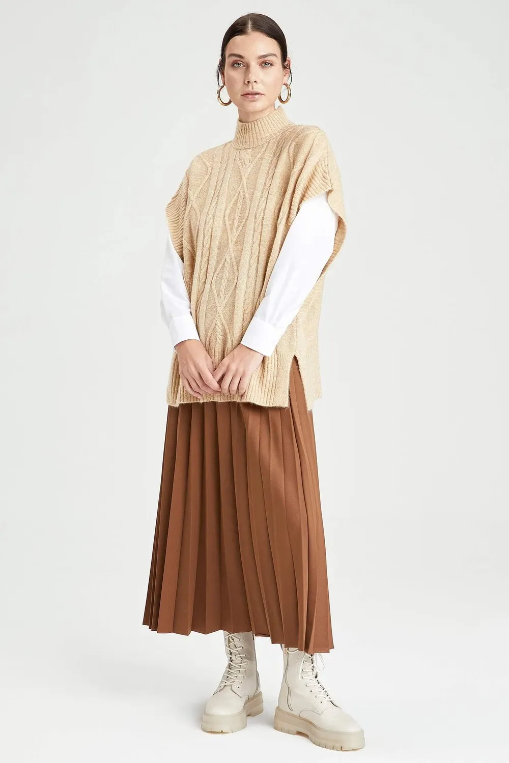 تنورة طويلة بكسرات