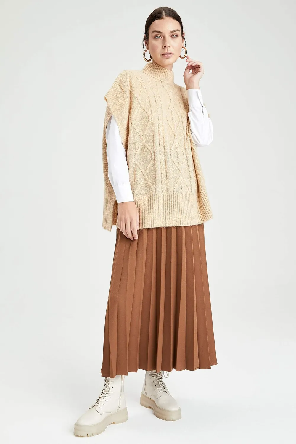 تنورة طويلة بكسرات
